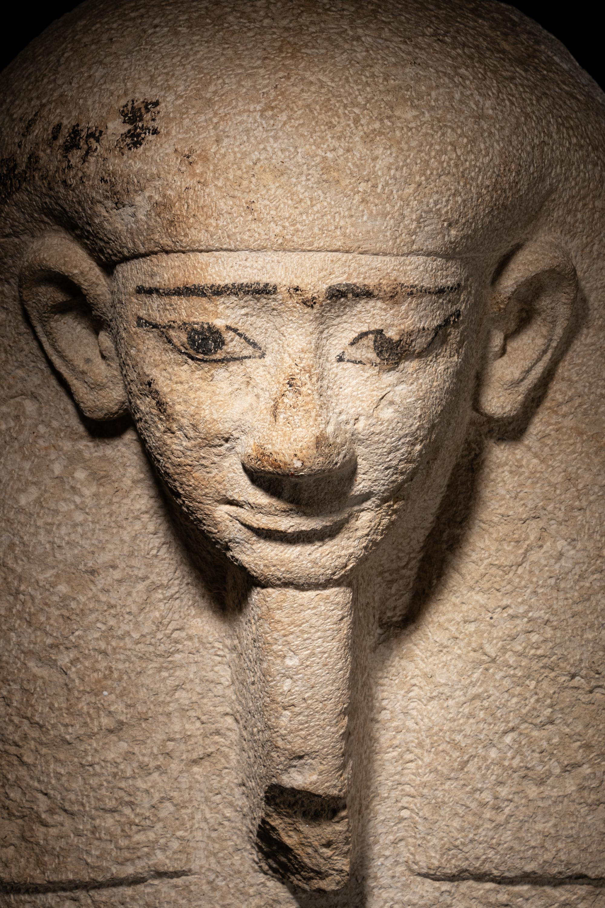 An Egyptian Limestone Sarcophagus Lid