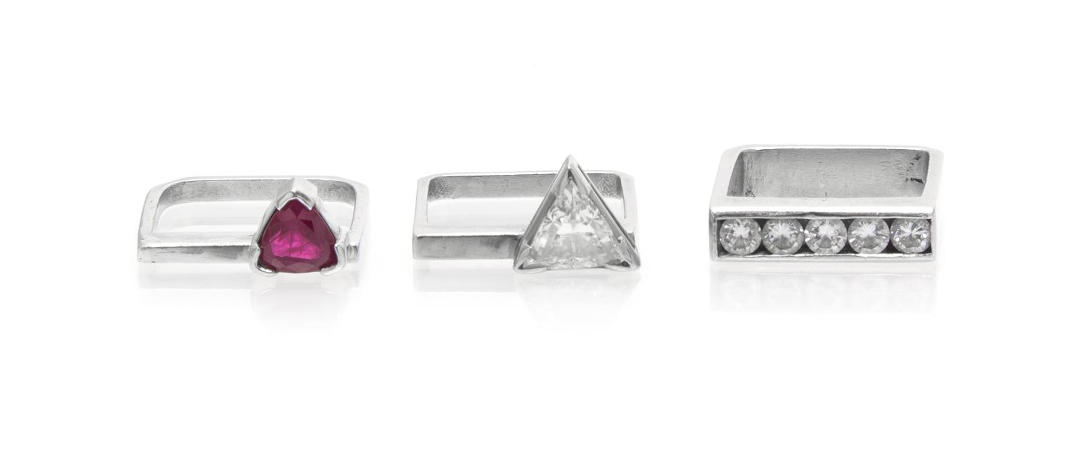 A Set of Platinum, Diamond and Ruby Stacking Rings, 11.60 dwts.