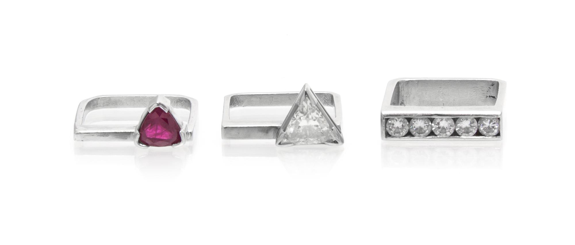 A Set of Platinum, Diamond and Ruby Stacking Rings, 11.60 dwts.