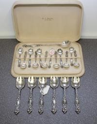 An American Silver Dessert Service, International Silver Co., Wallingford, CT, Frontenac pattern, comprising 12 chocolate spoons, 6 ice