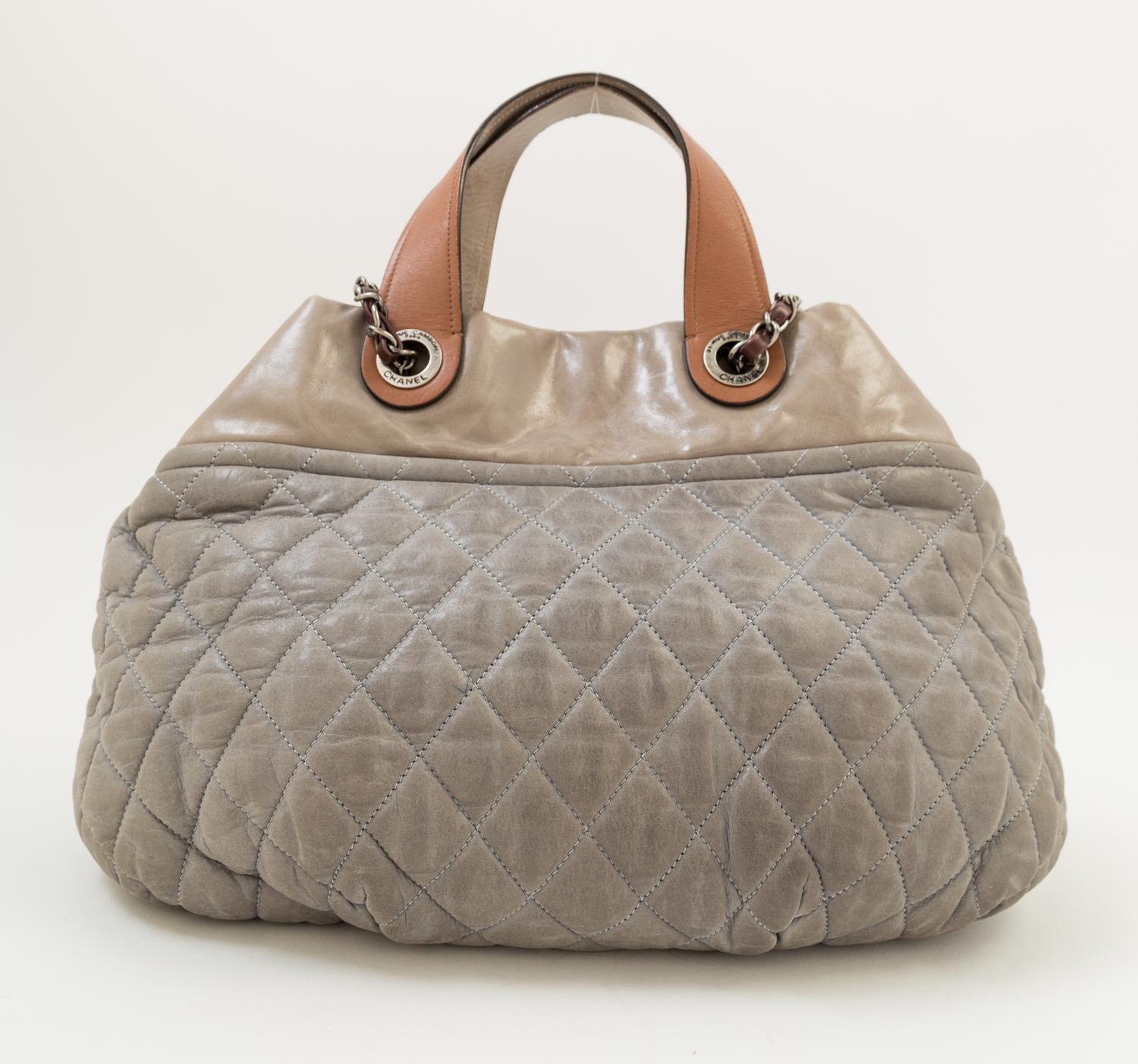 A Chanel Grey Leather Quilted Handbag, 15" x 10" x 5.5"; Handle drop: 4".
