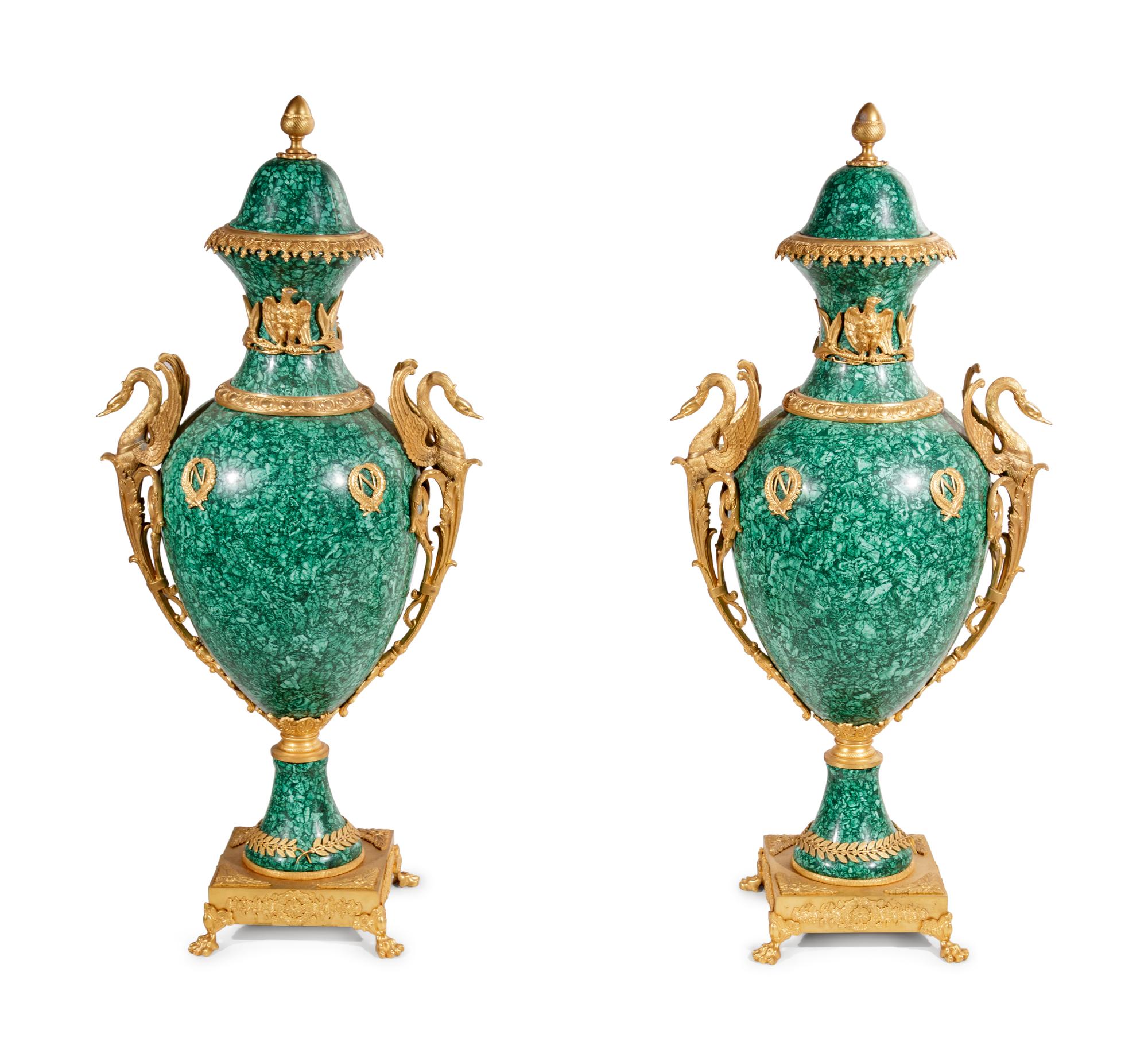 A Pair of Empire Style Gilt Bronze Mounted Malachite Veneered Urns