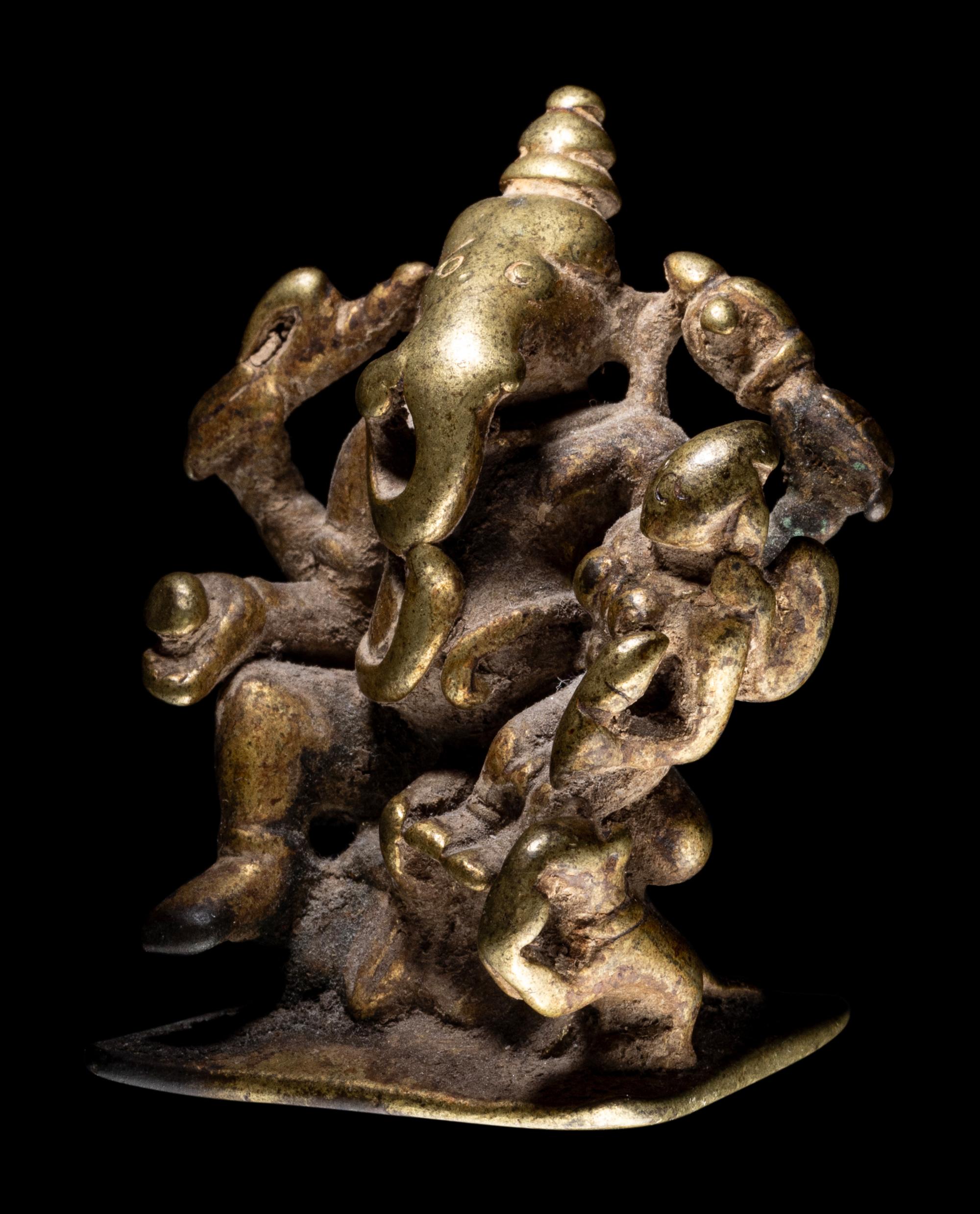 A Small Indian Brass Figural Group of Ganesha and Shakti