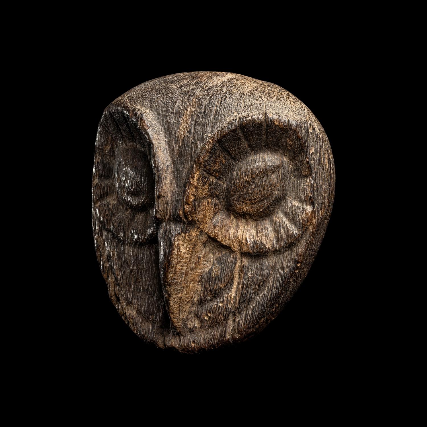 An Early Mochica Algarroba Wood Owl's Head