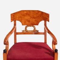 A Pair of Swedish Neoclassical Birchwood Ebonized and Parcel Gilt Armchairs circa 1820