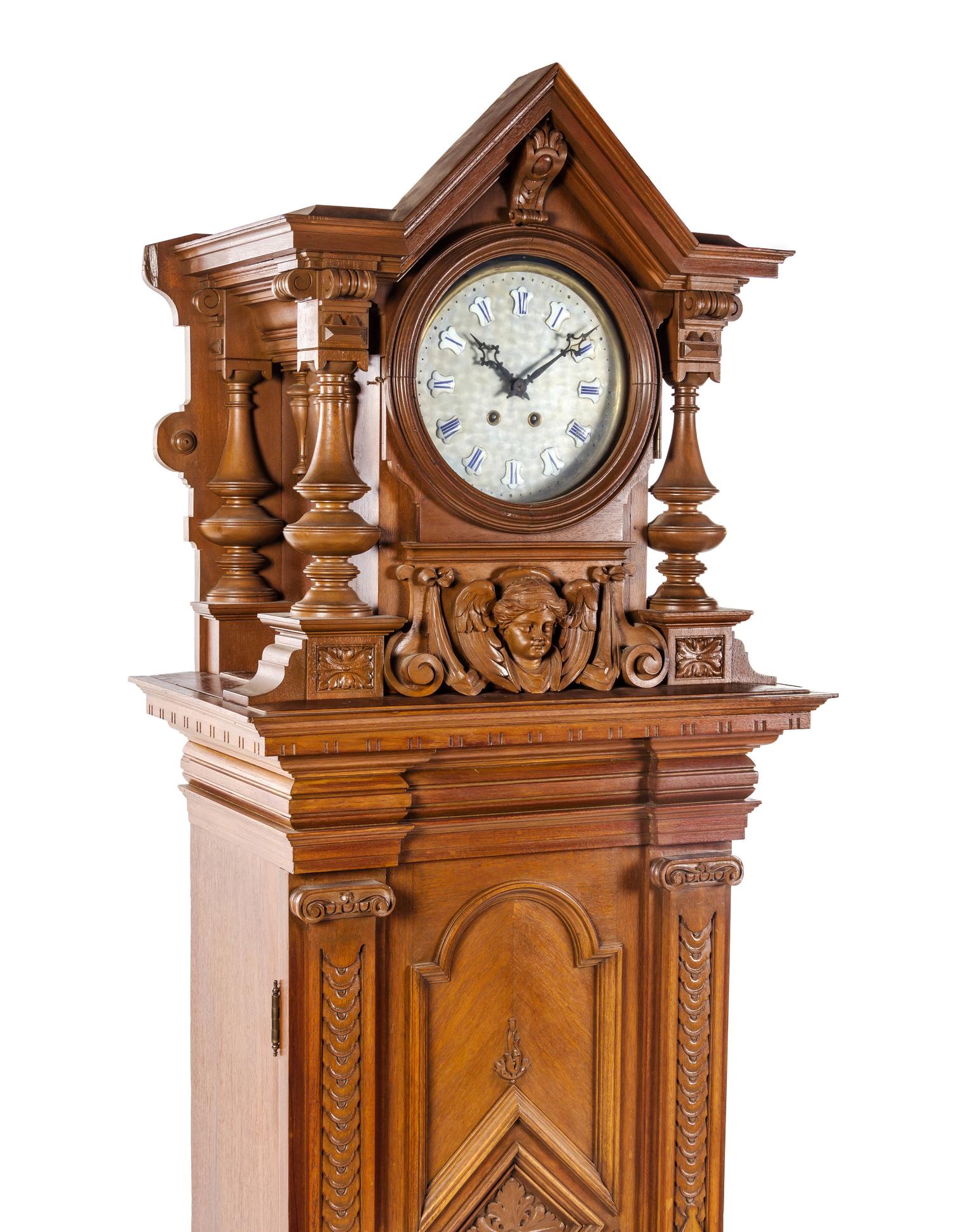 A German Walnut Musical Triple Disc Eroica Tall Case Clock, Height 85 1/2 inches.