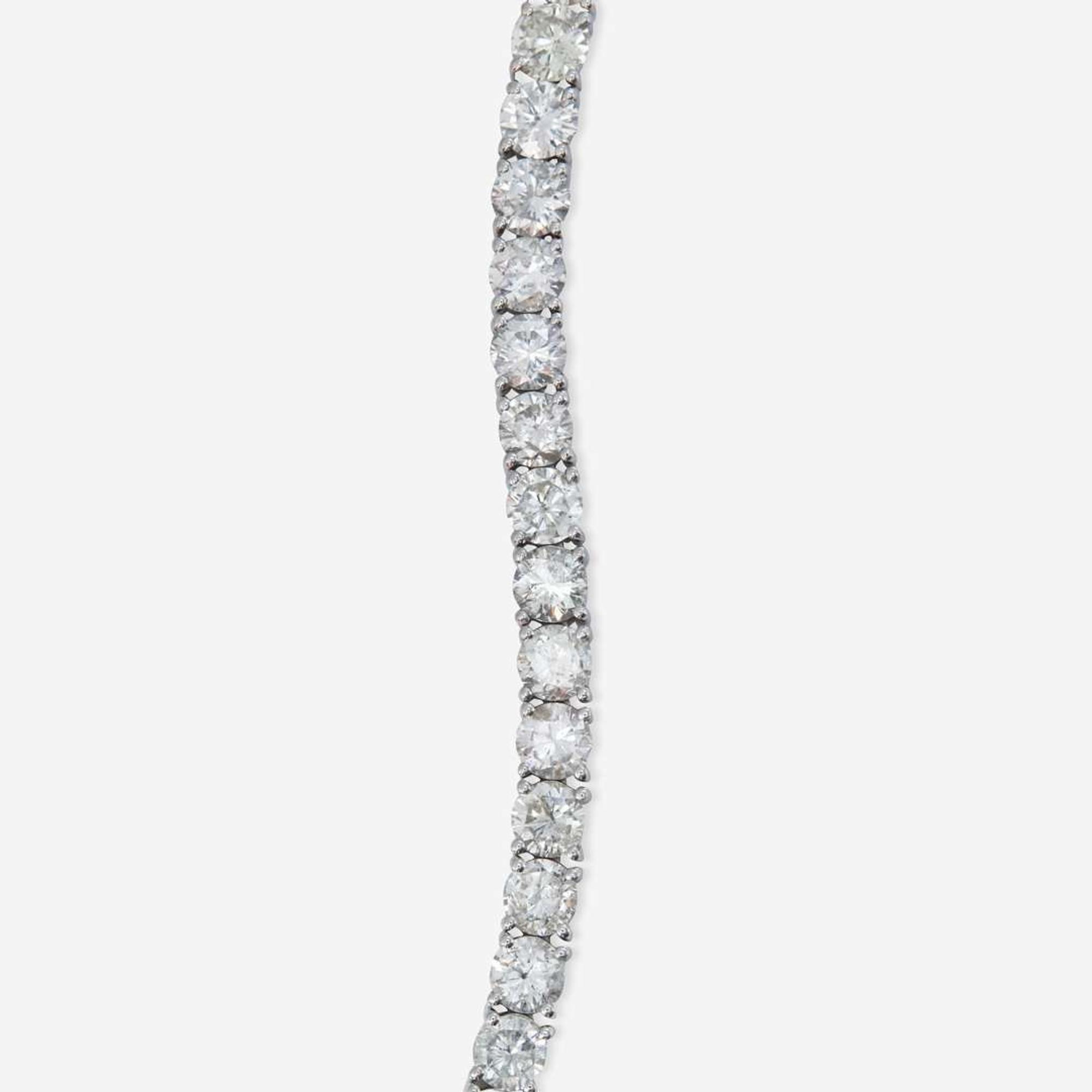 A 14K White Gold and Diamond Line Bracelet