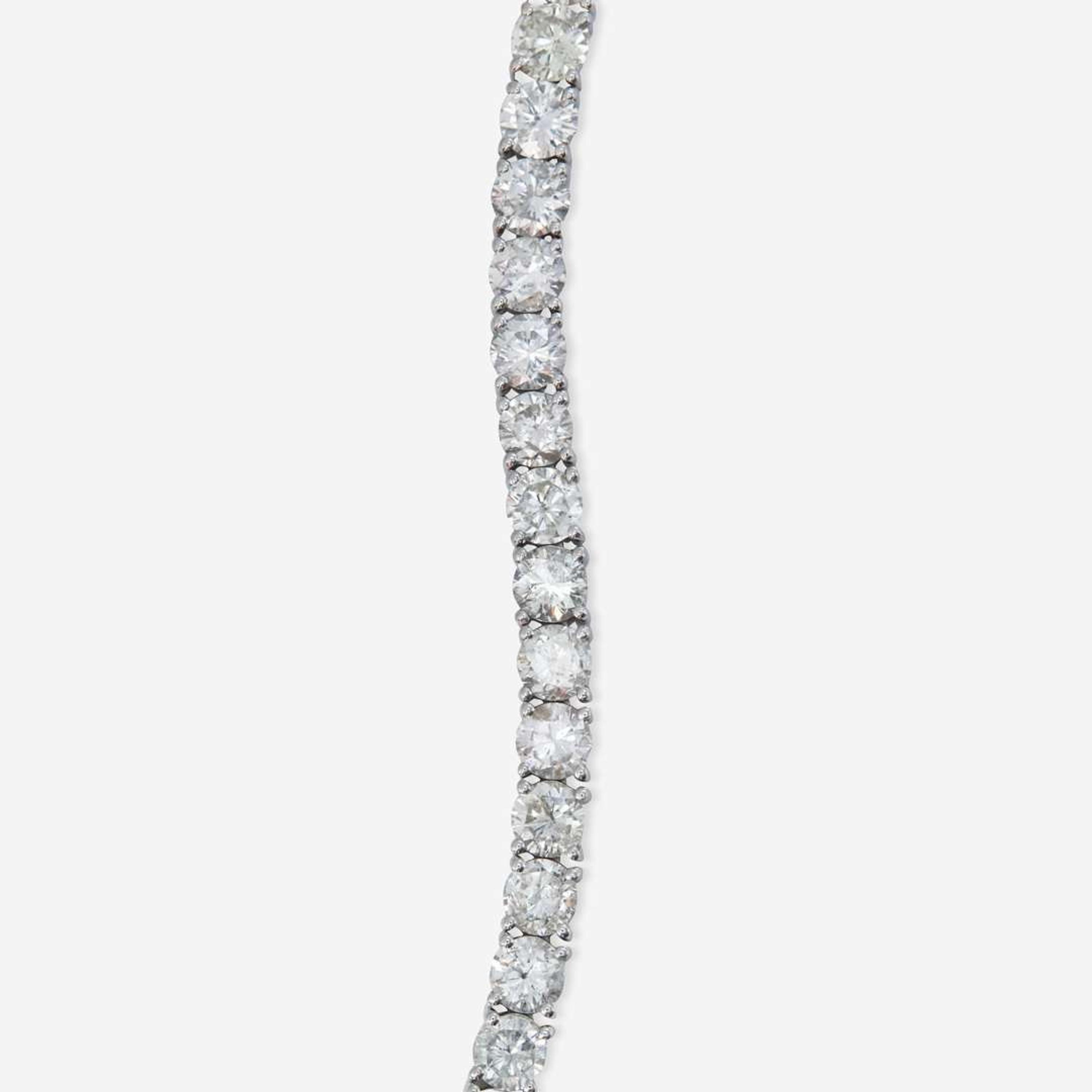 A 14K White Gold and Diamond Line Bracelet