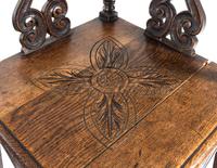 A William and Mary Carved Oak Corner Chair