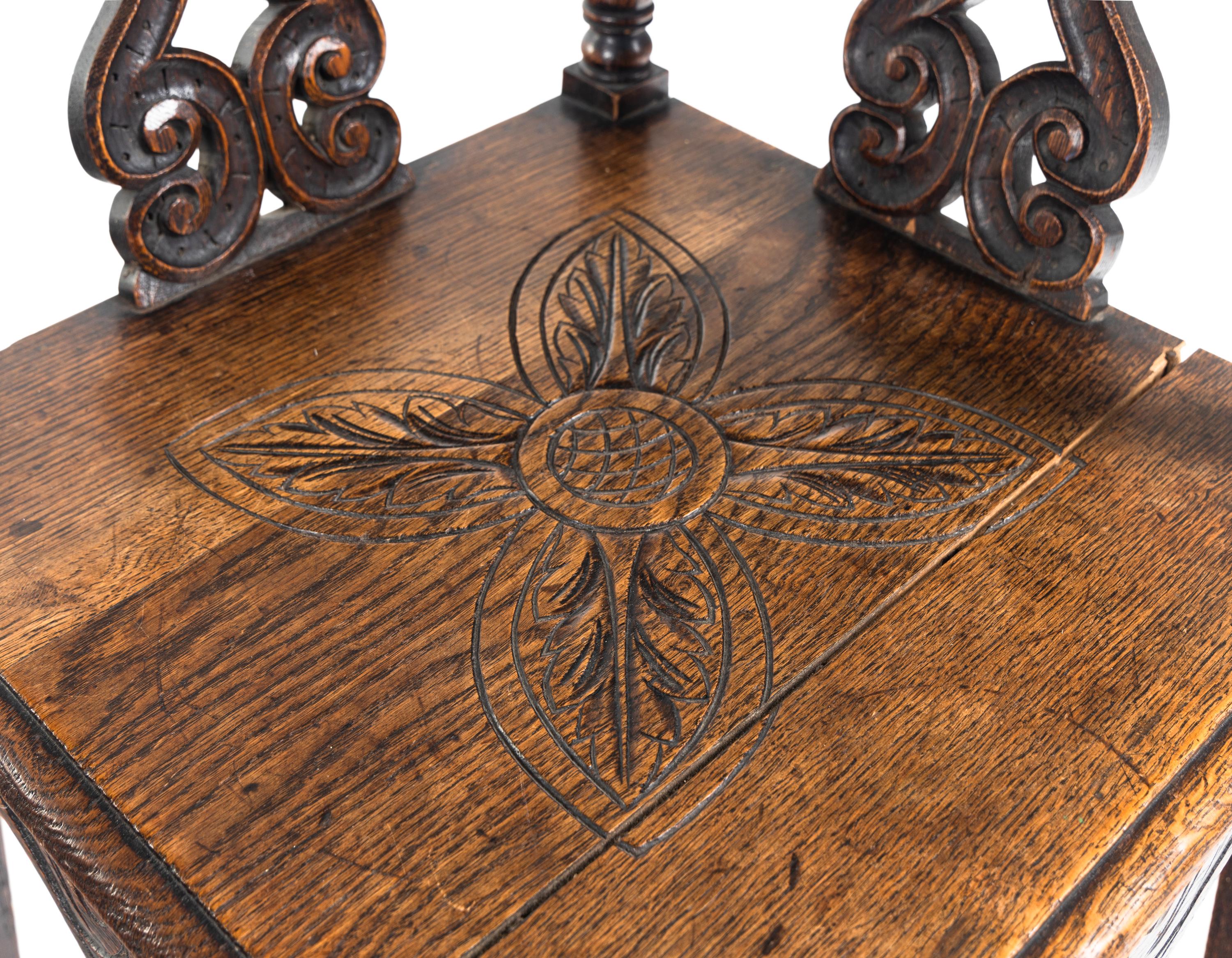 A William and Mary Carved Oak Corner Chair