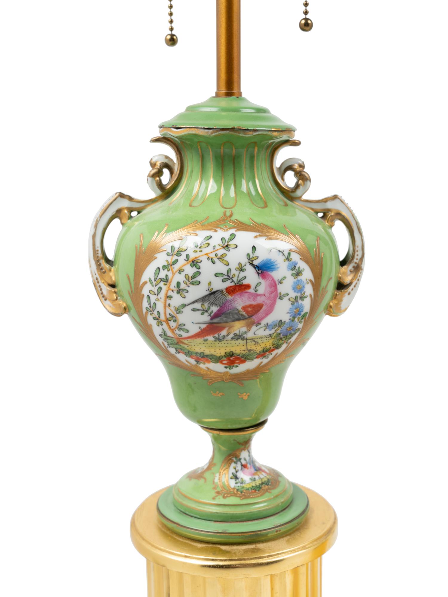 A Pair of Sèvres Style Porcelain and Giltwood Urns Mounted as Lamps