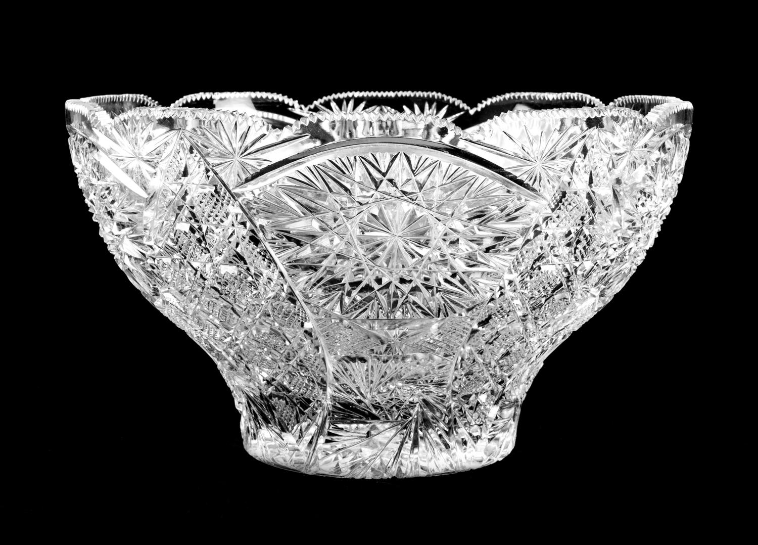An American Cut Glass Punch Bowl Height 7 1/2 x diameter 12 7/8 inches.