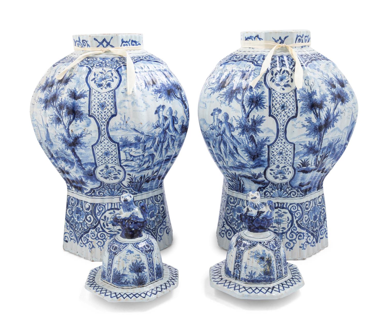 A Pair of Large Delftware Vases and Covers