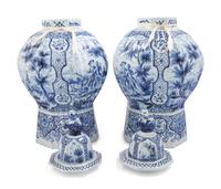 A Pair of Large Delftware Vases and Covers