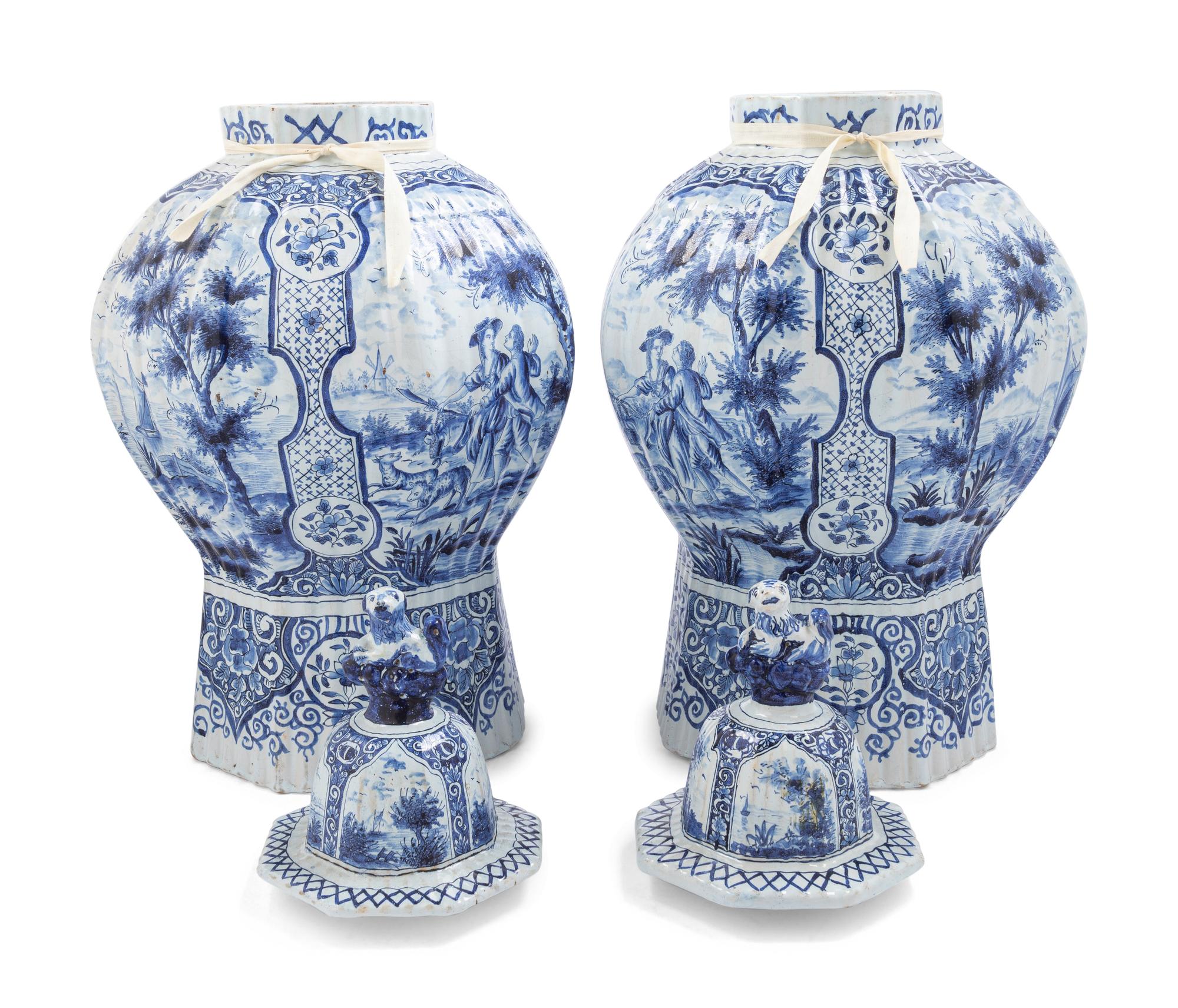 A Pair of Large Delftware Vases and Covers