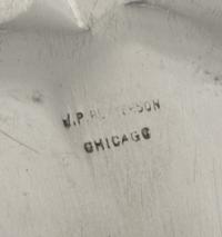 An American Silver Bowl, J.P. Peterson, Chicago, IL, 1920, of circular form with lobed sides and a spot-hammered finish, the underside