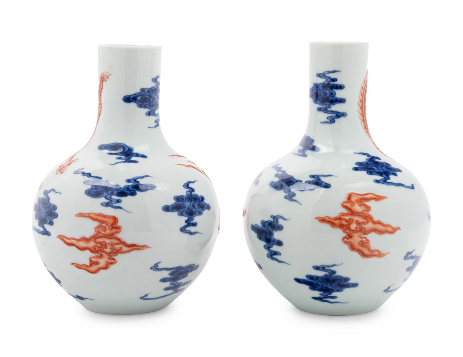 A Pair of Chinese Iron Red Decorated and Underglaze Blue Porcelain Bottle Vases