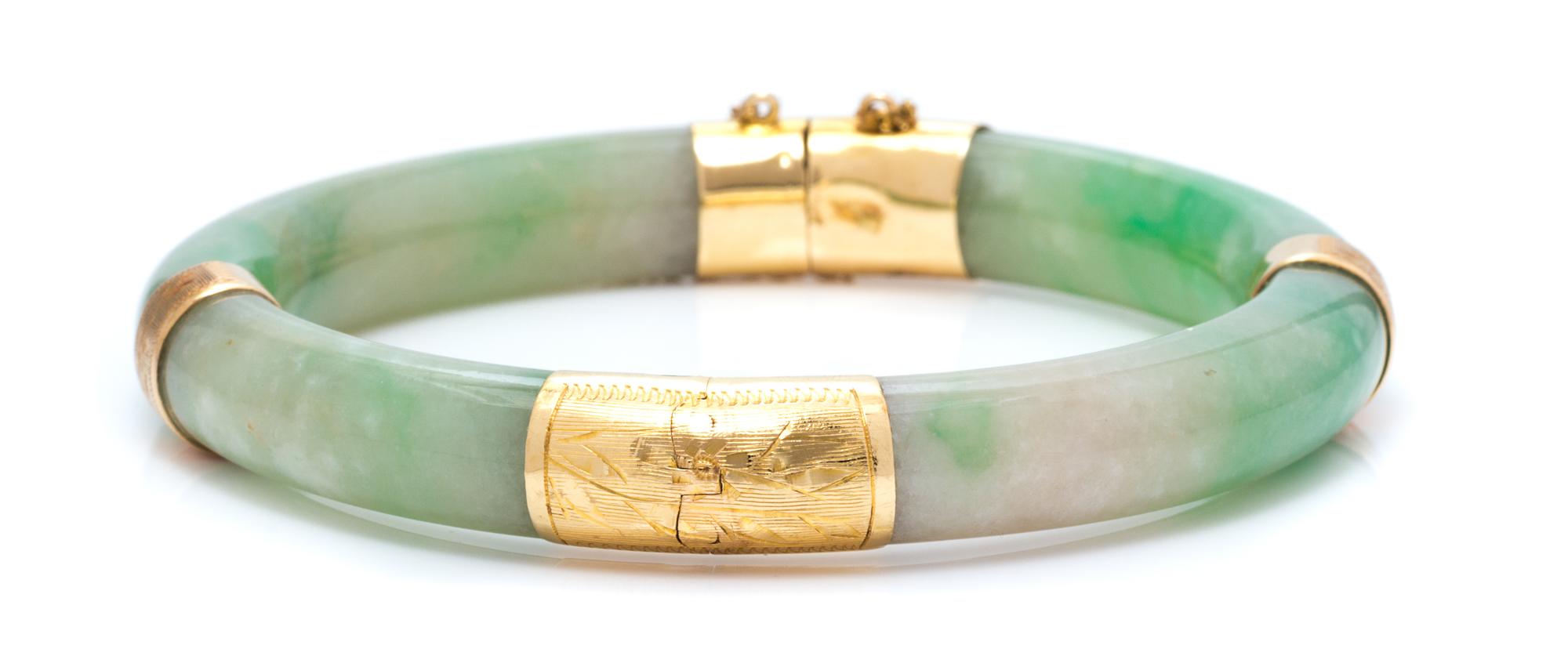 A Yellow Gold and Jade Bangle Bracelet, 29.20 dwts.