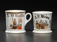 A Tinsmith and A Blacksmith's Porcelain Occupational Shaving Mugs