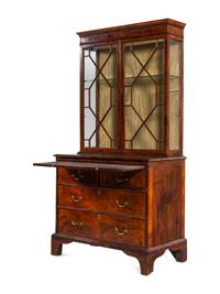 A George III Figured Walnut Bookcase-on-Chest