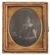 [EARLY PHOTOGRAPHY]. Sixth plate daguerreotype of a lovely African American woman. Ca 1850s.