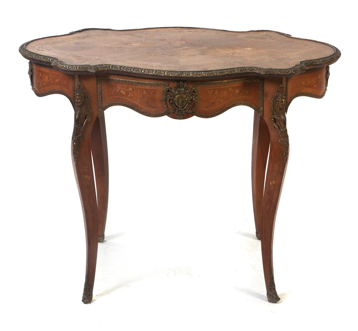 A Louis XV Style Gilt Metal Mounted Marquetry Center Table, Height 30 x width 40 x depth 26 inches.