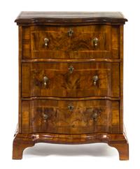 An Austrian Walnut Veneered Chest of Drawers Height 31 inches. — 19TH CENTURY