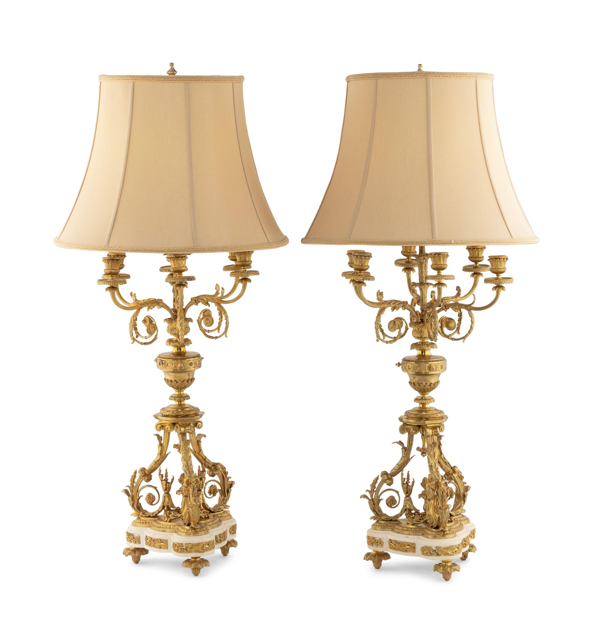 A Pair of Louis XVI Style Gilt Bronze and Marble Six-Light Candelabra