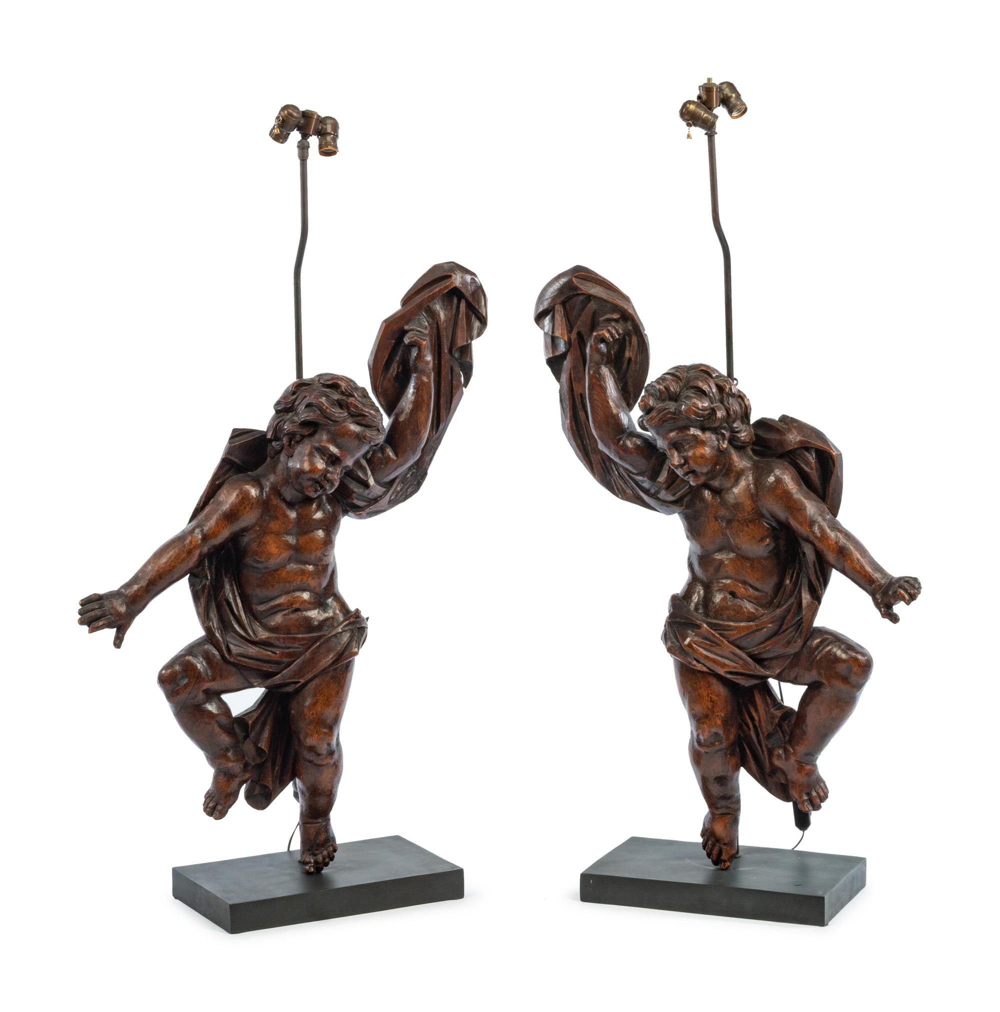 A Pair of Italian Carved Walnut Altar Figures Mounted as Lamps