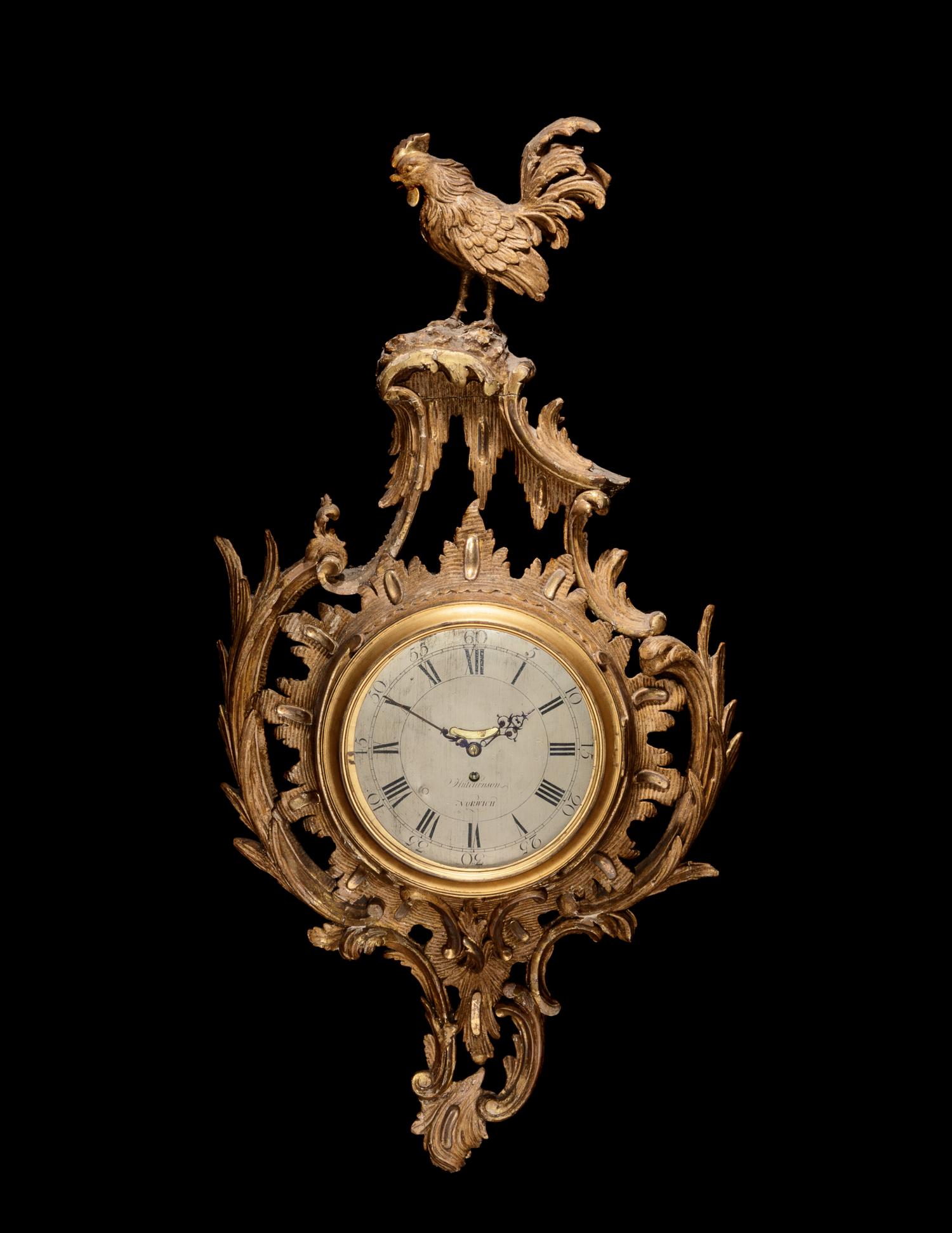 A George II Carved Giltwood Cartel Clock