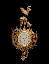 A George II Carved Giltwood Cartel Clock