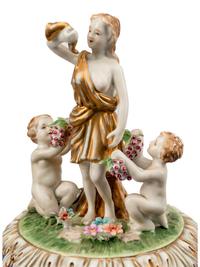 A Pair of German Porcelain Tureens, Covers and Stands