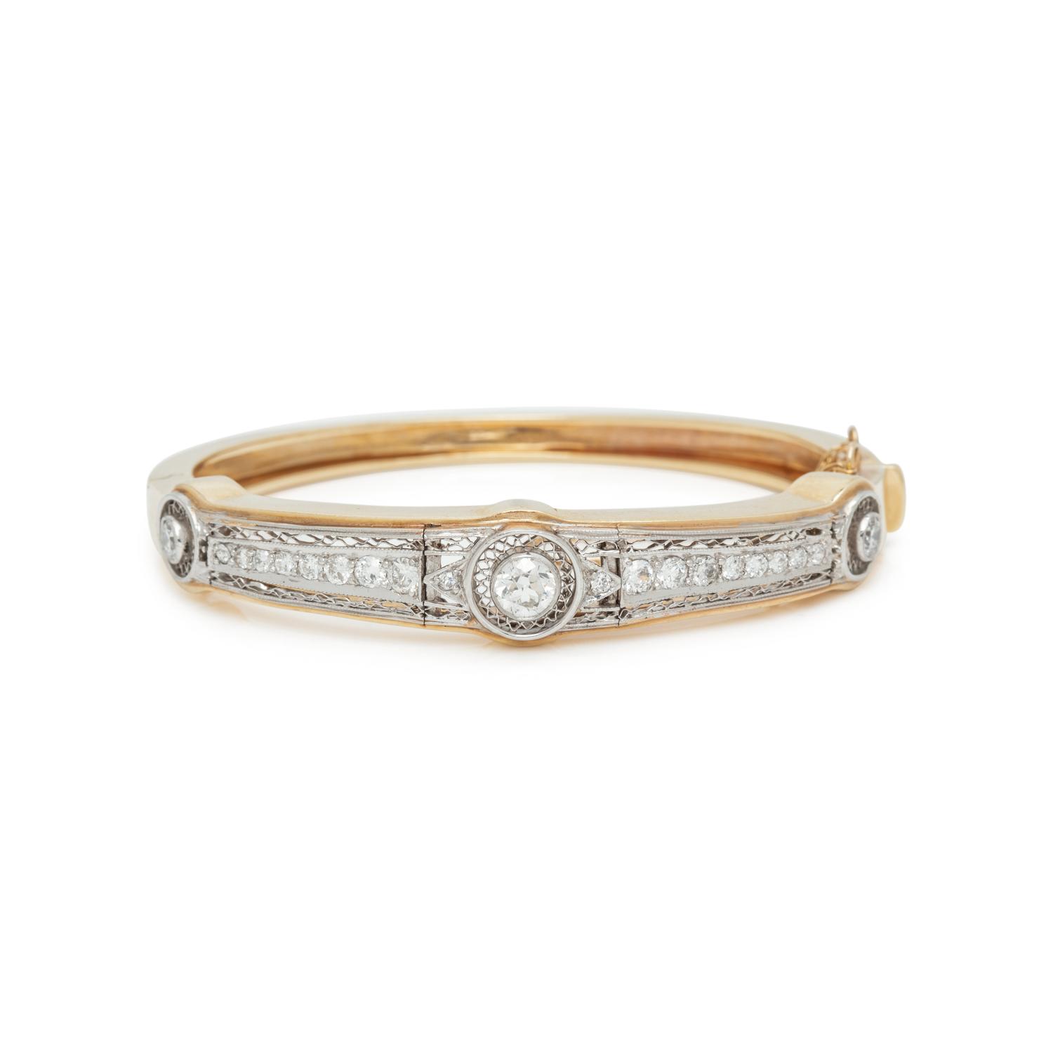YELLOW GOLD, PLATINUM AND DIAMOND BANGLE BRACELET