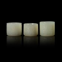 Three Chinese White Jade 'Double Happiness' Archer’s Rings, 19th Century 清晚期 白玉’雙喜‘扳指組三枚