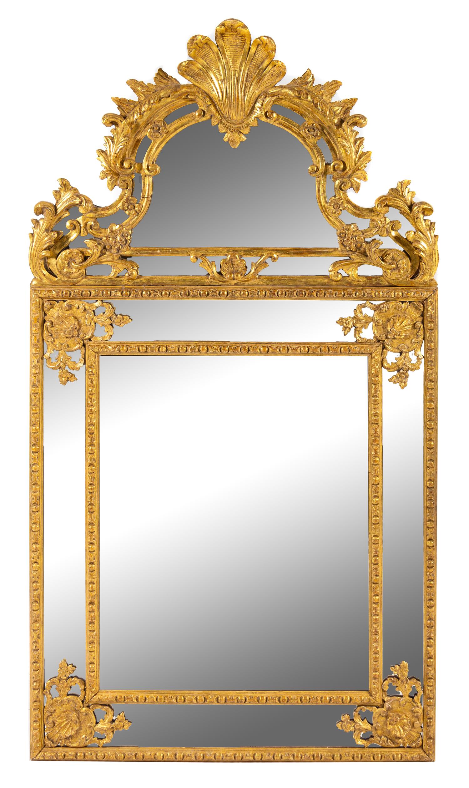 A Regence Giltwood Mirror Height 66 x width 36 inches. — 18TH CENTURY