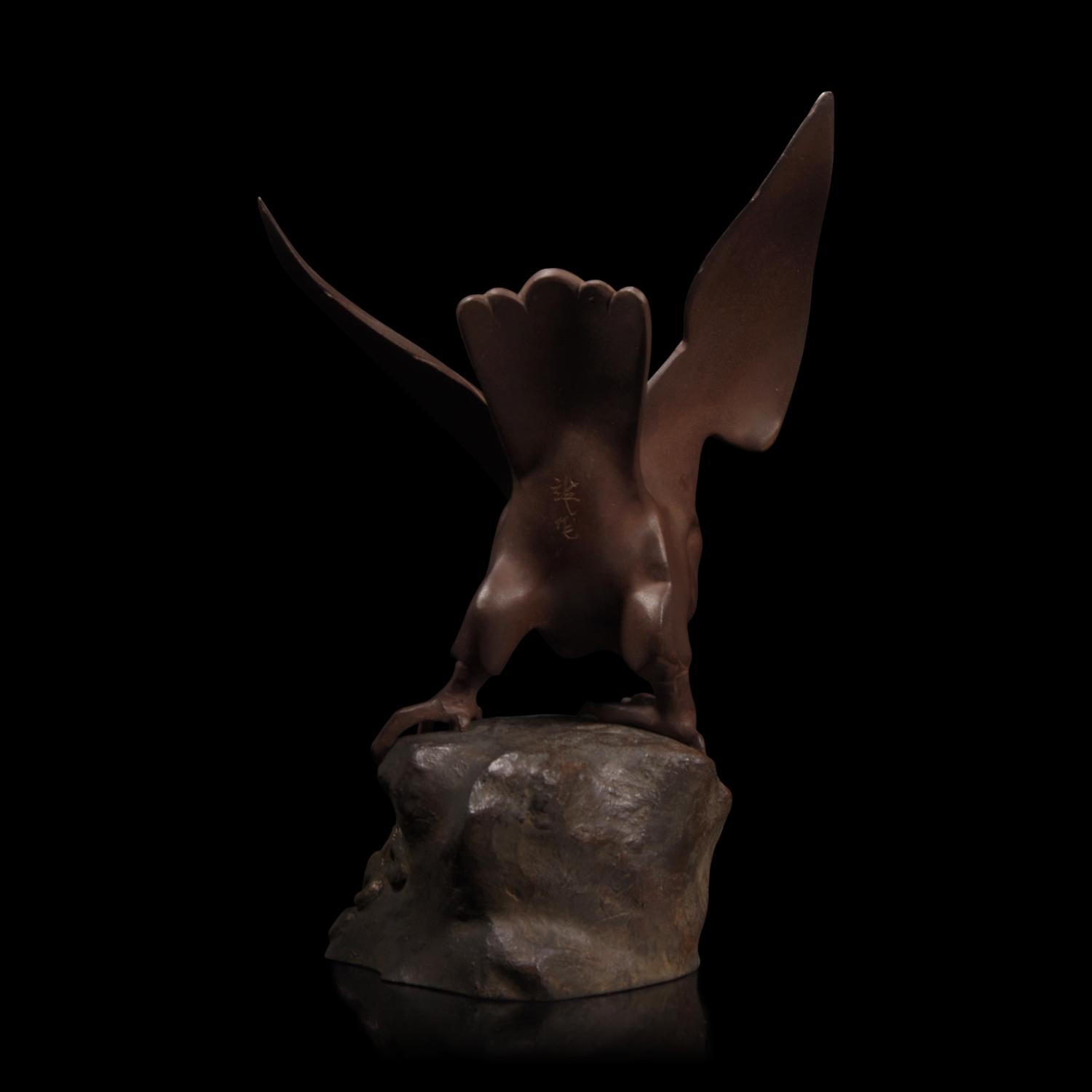 A Japanese Patinated Bronze Figure of a Falcon, Showa Period