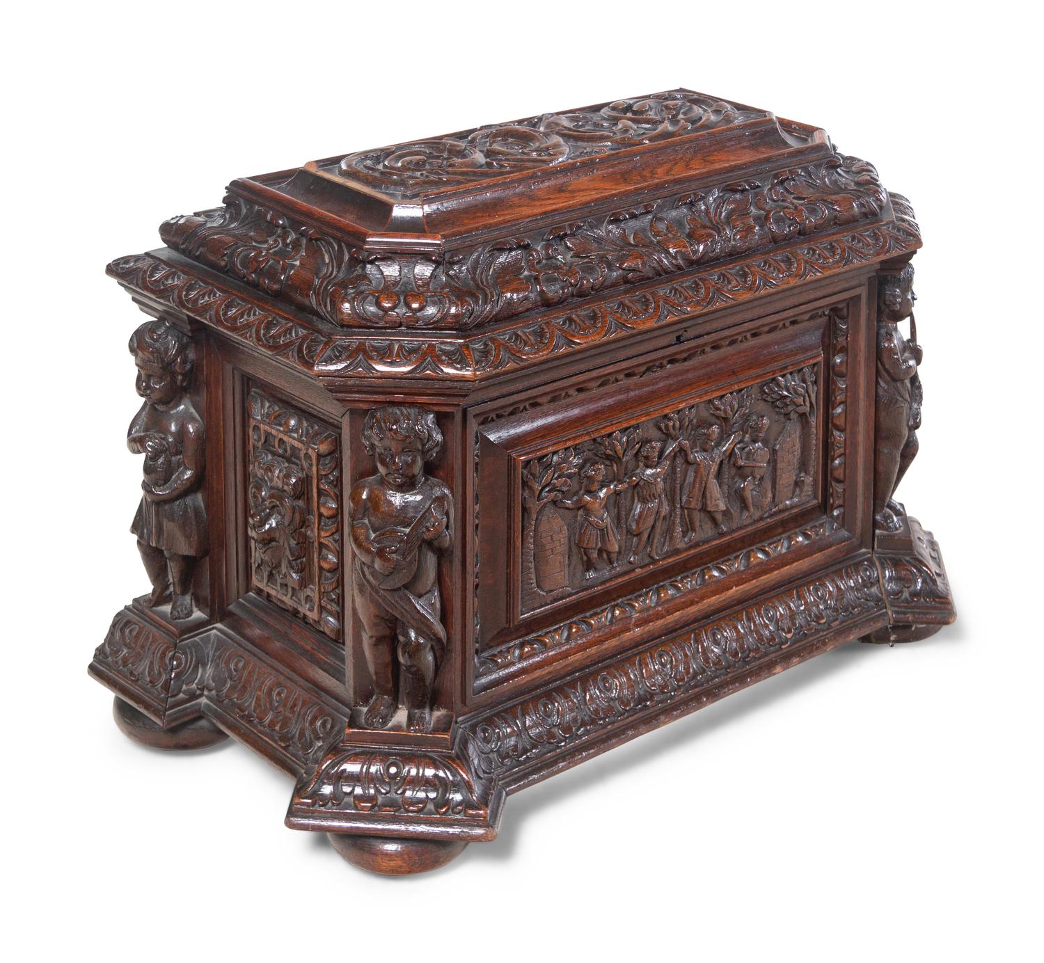 A Renaissance Revival Carved Oak Cellarette