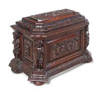 A Renaissance Revival Carved Oak Cellarette