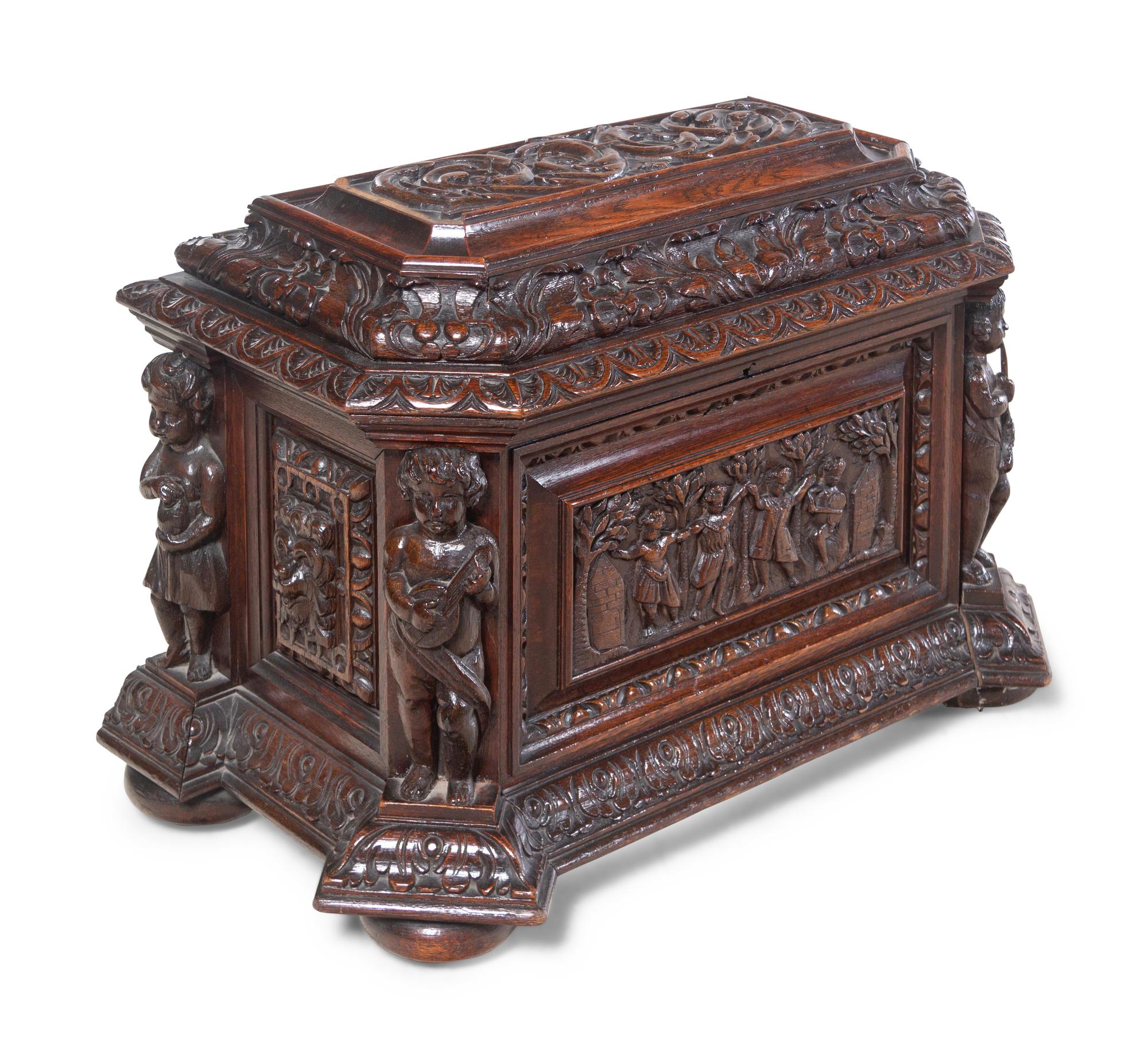 A Renaissance Revival Carved Oak Cellarette