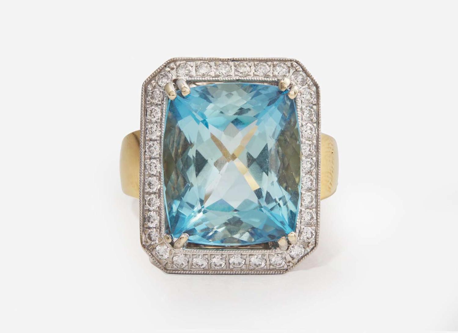 An 18K Gold, Aquamarine, and Diamond Ring