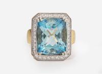 An 18K Gold, Aquamarine, and Diamond Ring