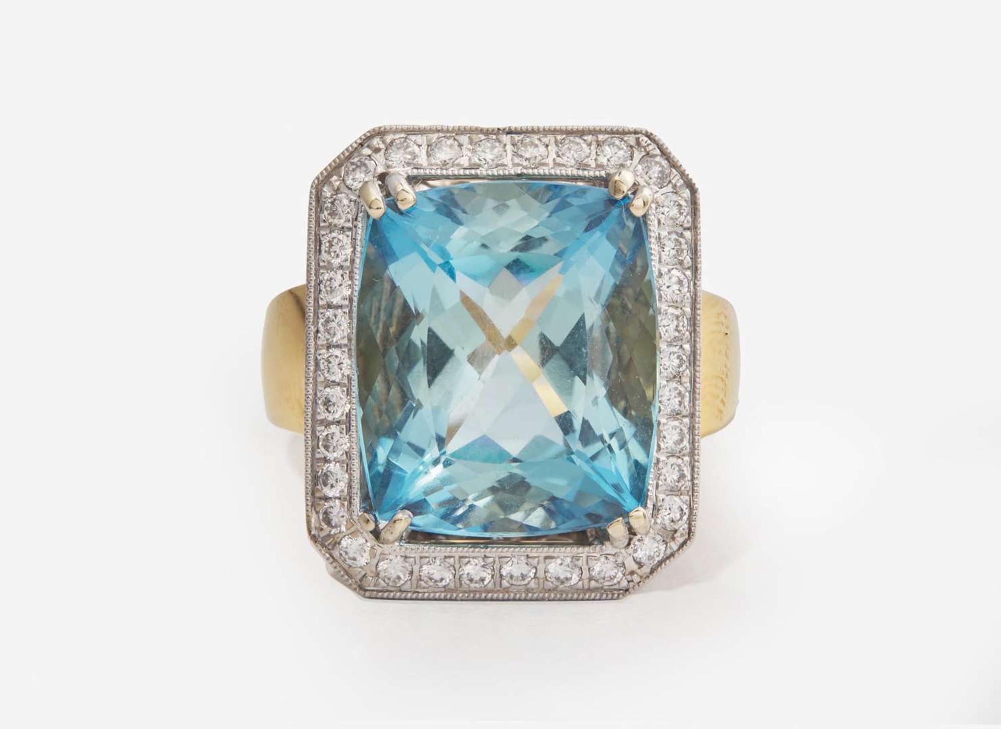 An 18K Gold, Aquamarine, and Diamond Ring