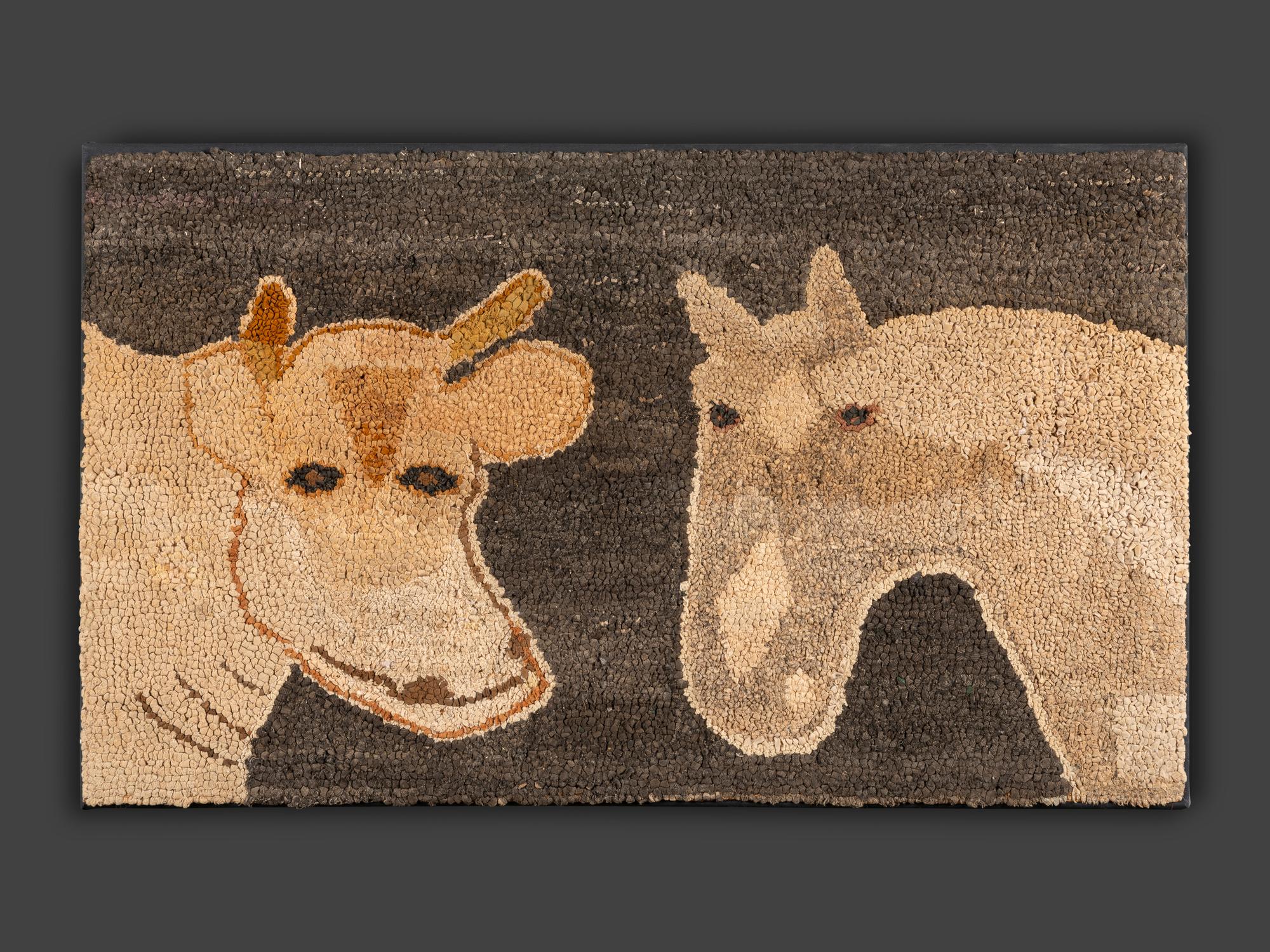 An American Cow and Horse Hooked Rug
