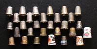 A Collection of Porcelain and Silver Thimbles Average height 1 inches. — VARIOUS AGES