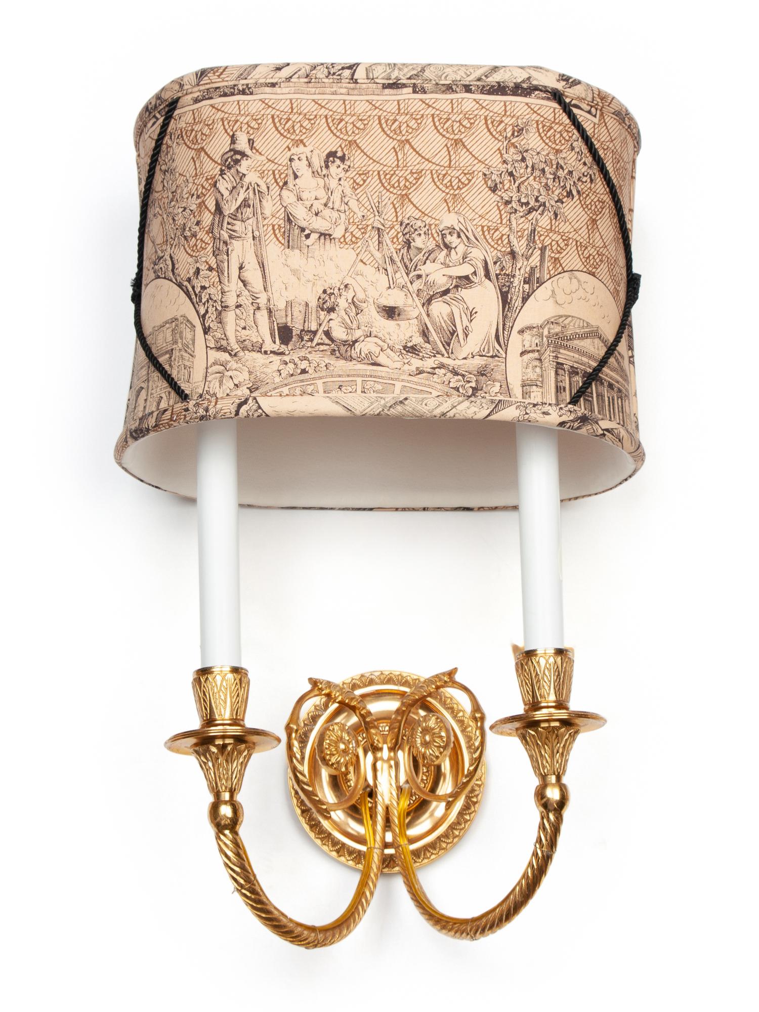 A Set of Three Gilt Metal Two-Light Sconces with Custom Shades