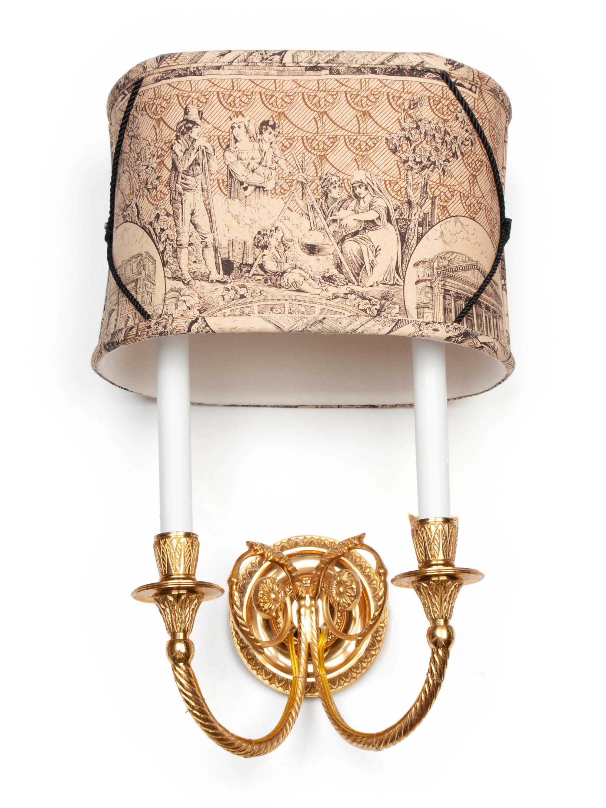 A Set of Three Gilt Metal Two-Light Sconces with Custom Shades