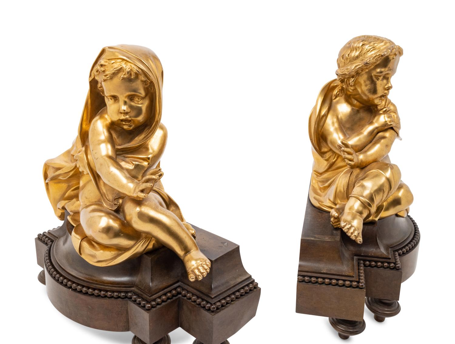 A Pair of French Gilt and Patinated Bronze Figural Chenets