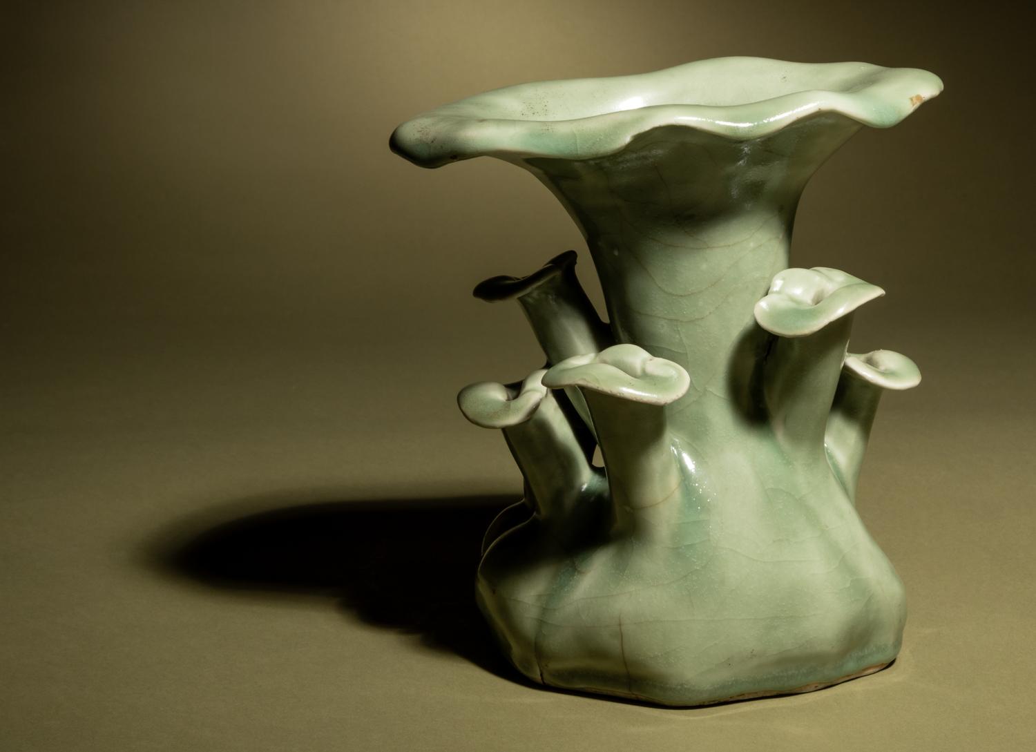 A Celadon Glazed Porcelain ‘Lingzhi’ Cache Pot