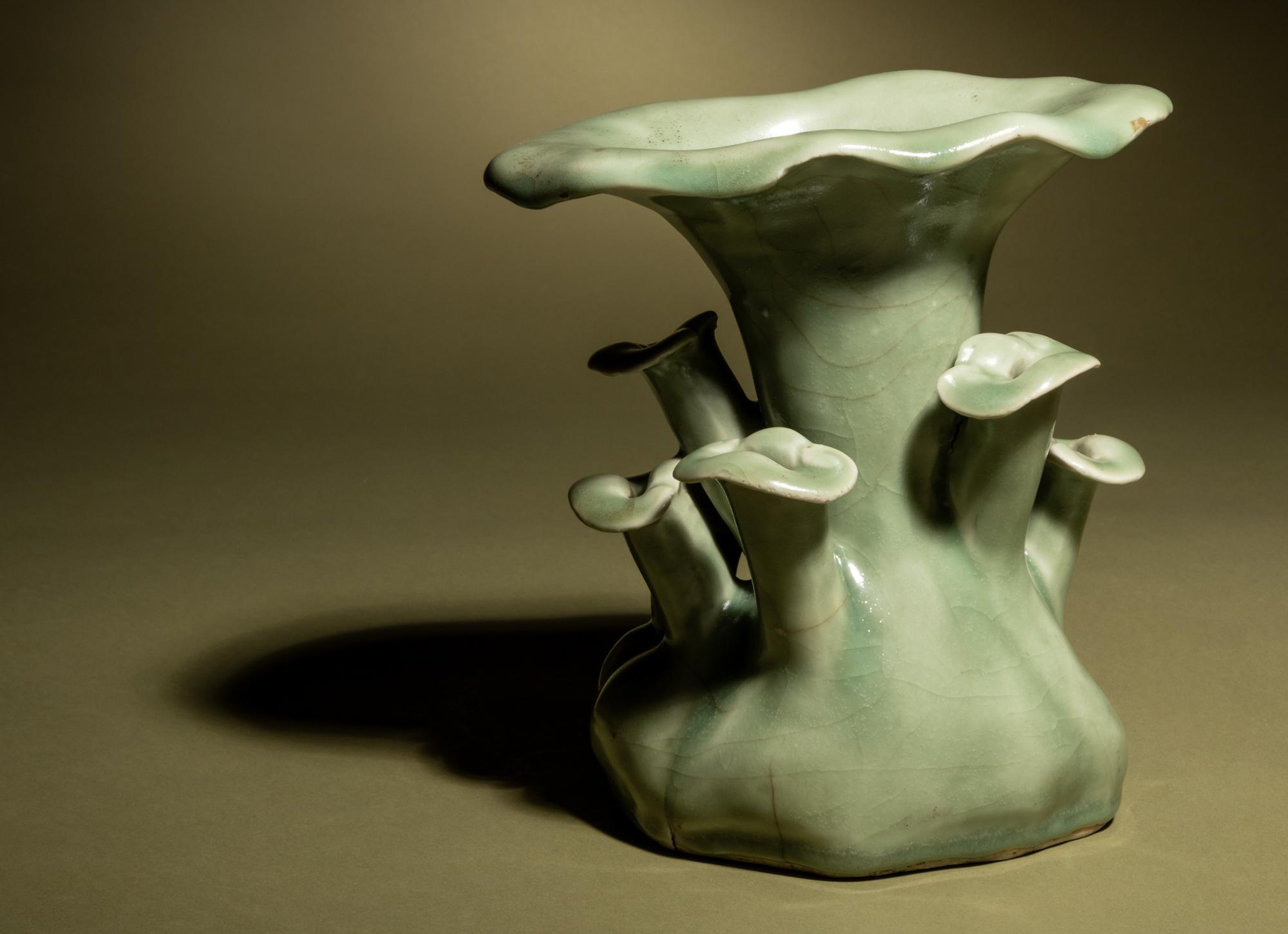A Celadon Glazed Porcelain ‘Lingzhi’ Cache Pot