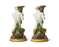 An Assembled Pair of Wedgwood Majolica Assembled Triton Candle Holders
